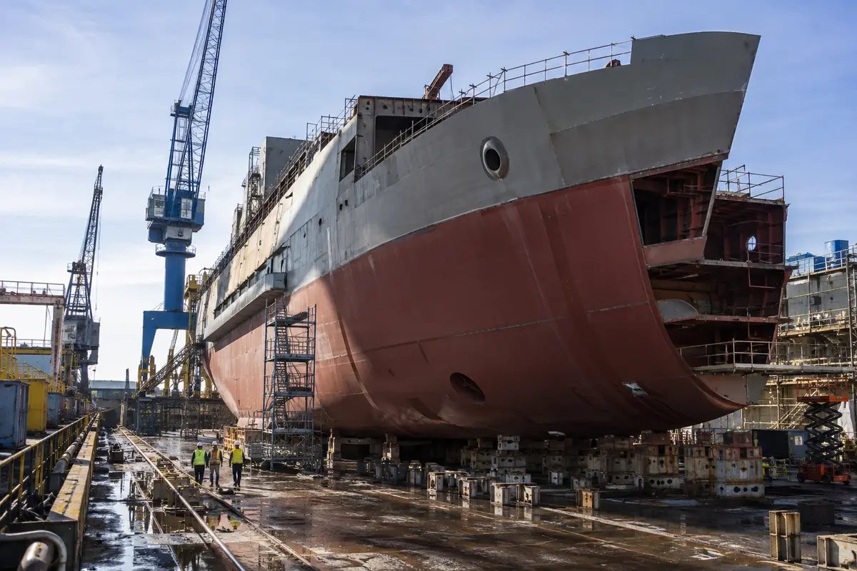 Ship hull under construction in drydock